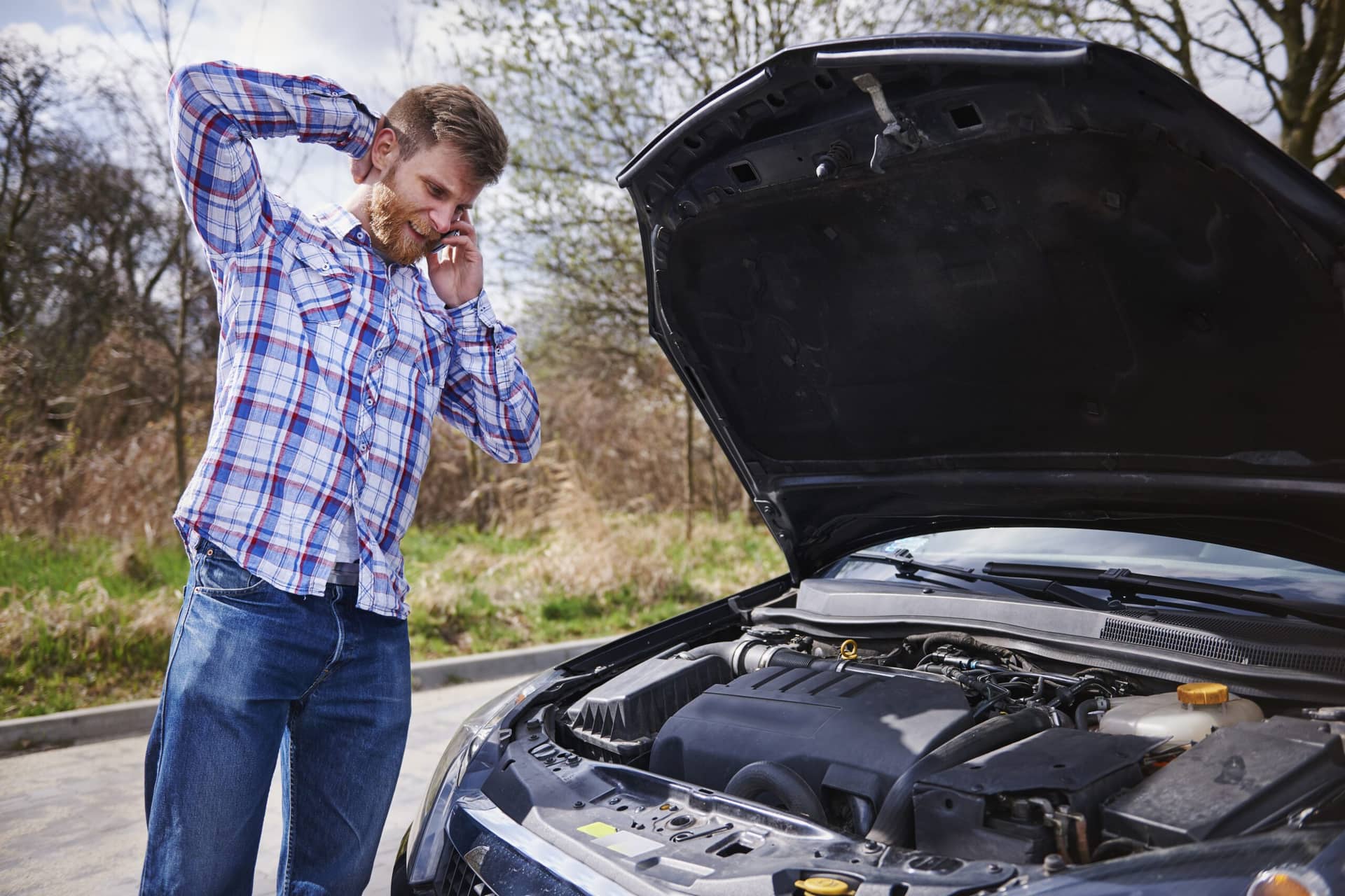 The man is having an issue with his car and getting problem with the long distance drive.